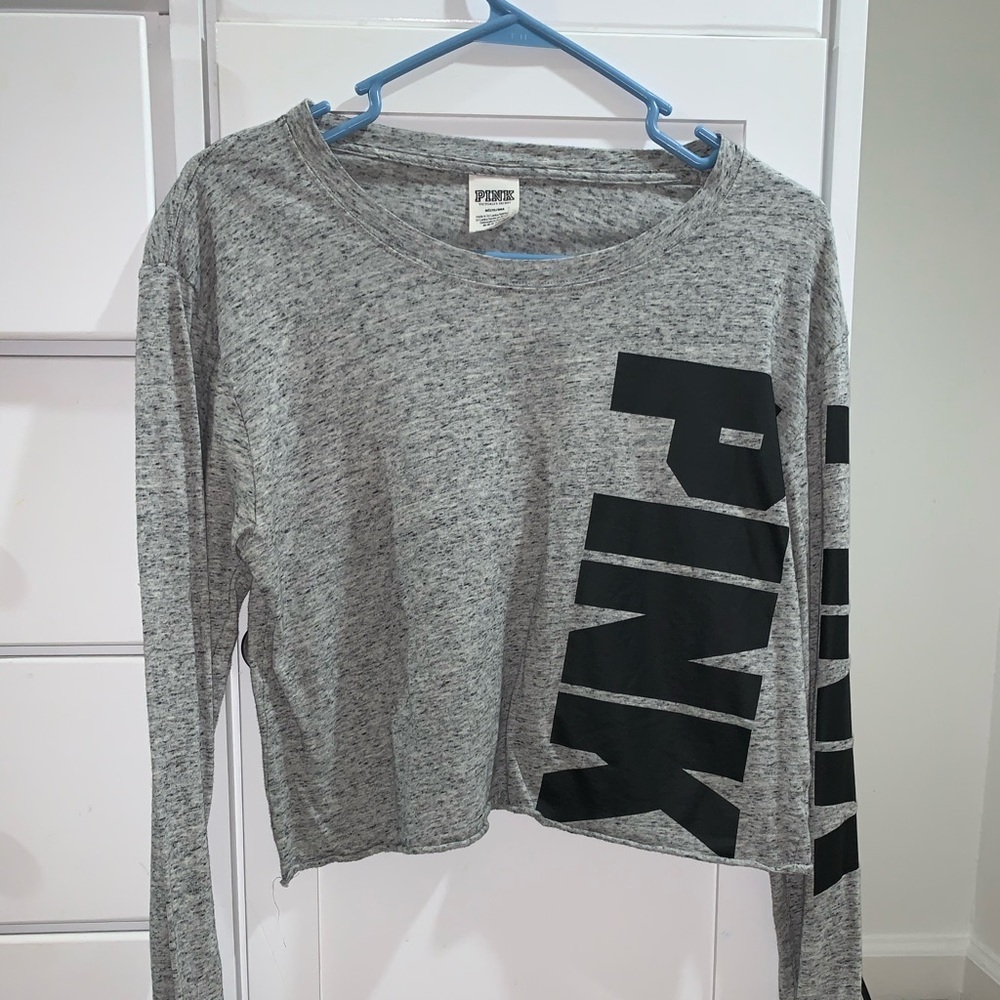 A pink crop top long sleeve